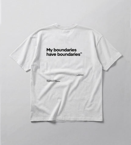 White t-shirt with black text on a light gray background