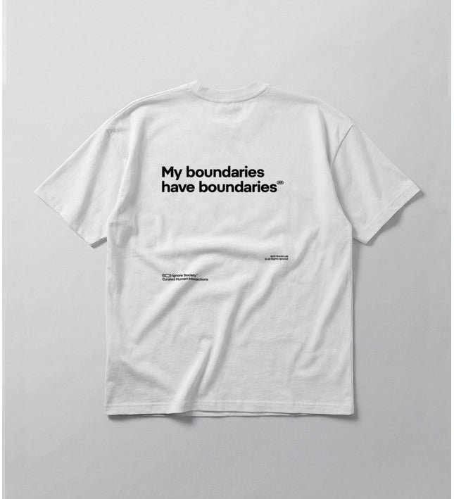 White t-shirt with black text on a light gray background