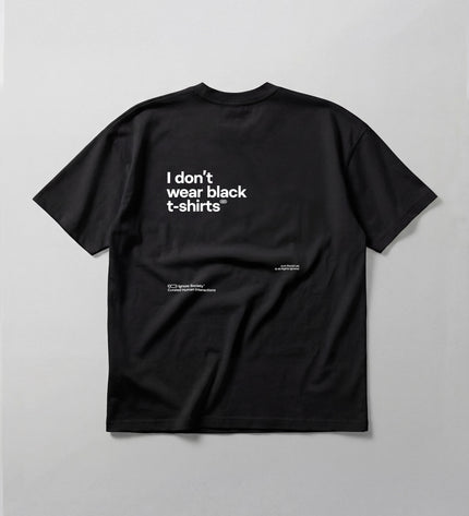 Black t-shirt with white text on a gray background