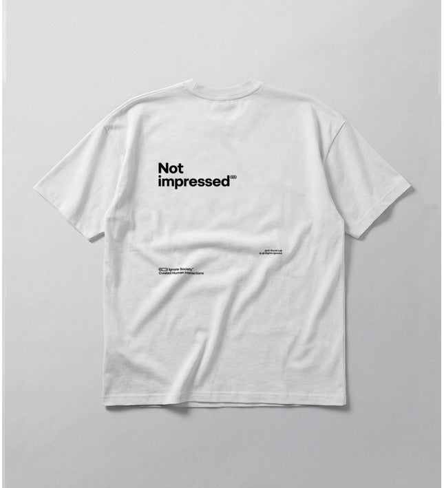 White t-shirt with 'Not impressed' text on a light gray background