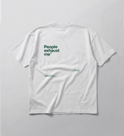 White t-shirt with text on a gray background