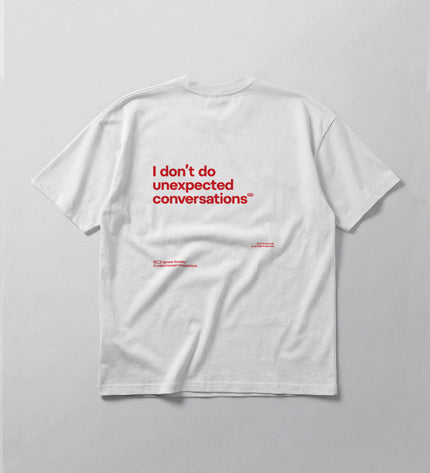 White t-shirt with red text on a light gray background