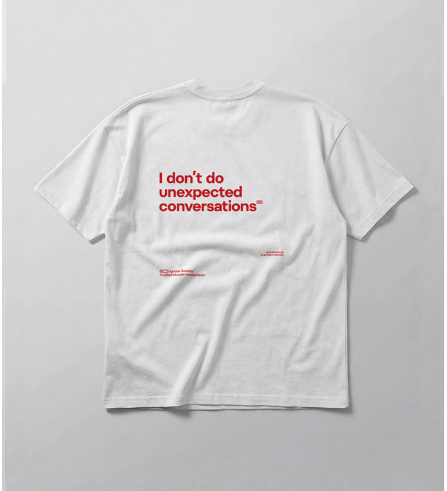 White t-shirt with red text on a light gray background