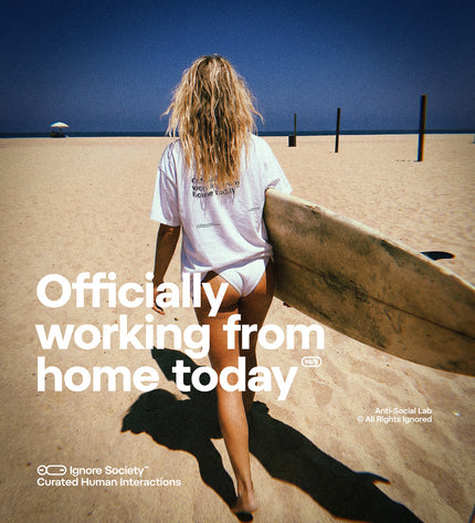 Person on a beach with text 'Officially working from home today' and branding.