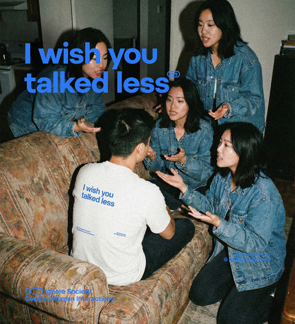 Group of people sitting on a couch with text overlay 'I wish you talked less' in a casual indoor setting.