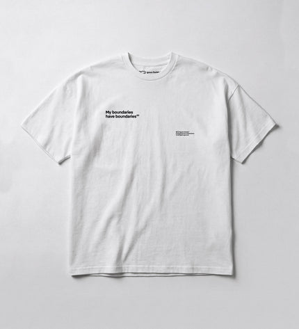 White t-shirt with black text on a light gray background