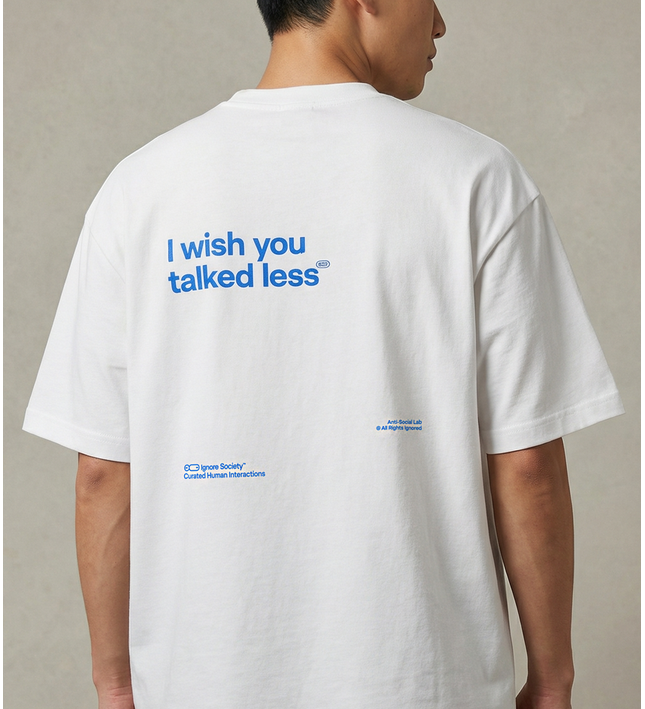 Person wearing a white t-shirt with blue text on the back against a neutral background